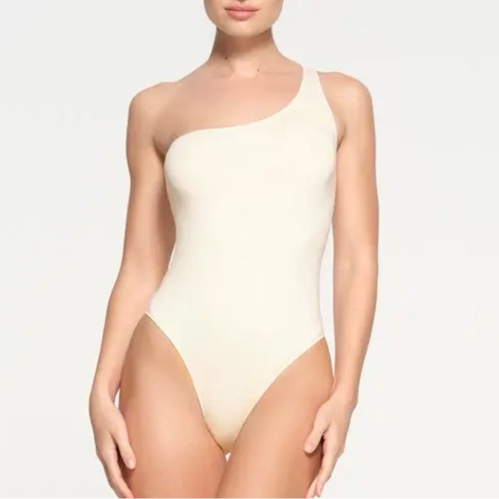 SKIMS One-Shoulder Cream Bodysuit